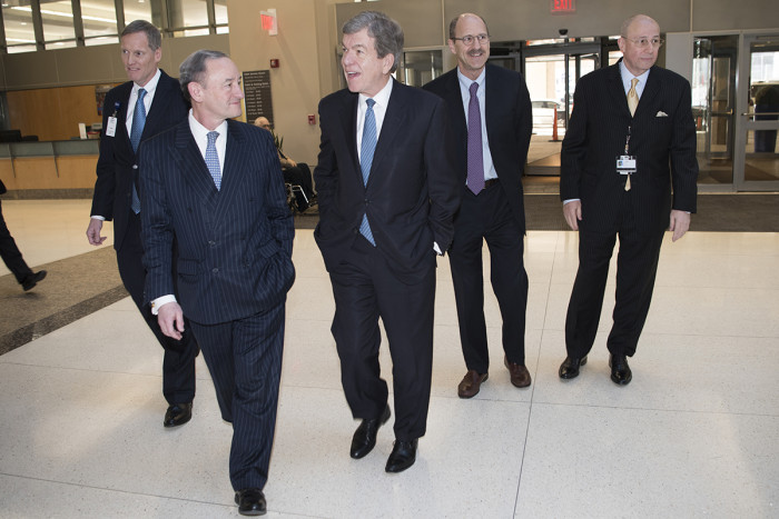 University leaders visit with U.S. Sen. Roy Blunt, R-Mo., Jan. 5 on the Medical Campus. From the left are Bob Cannon, xx, Chancellor Mark S. Wrighton; Blunt; David H. Perlmutter, MD, executive chancellor for medical affairs and dean of the School of Medicine; and Tim Eberlein, MD, .. 