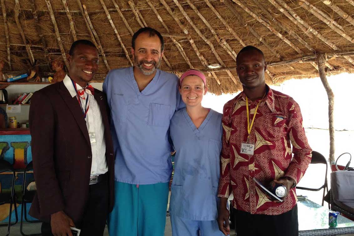 Shown is the leadership team at an Ebola treatment unit (ETU) in Port Loko, Sierra Leone, in 2015. From the left: Usman Koroma, Indi Trehan, MD, Cecilia Rose English and Francis Gaima. Usman and Francis headed the Sierra Leonean clinical team; Trehan, of Washington University, and English led the ETU and the Partners In Health team.