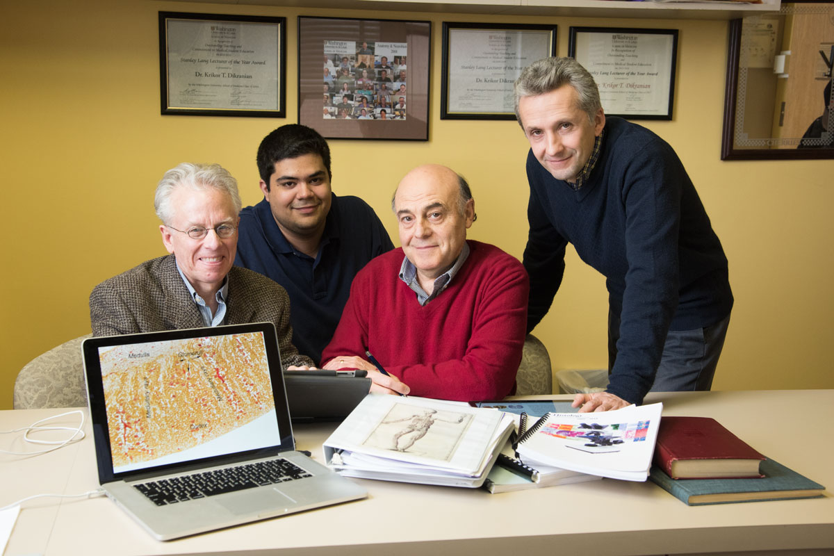 A team at the School of Medicine has created medical textbooks in iBook form. The team includes (from left) coauthor Paul Bridgman, PhD; MD-PhD student Gary Grajales-Reyes; coauthor Krikor Dikranian, MD, PhD; and electronic technician Valentin Militchin.