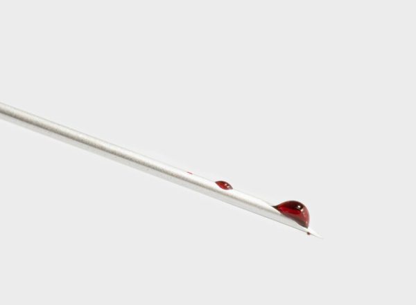 drop of blood on needle