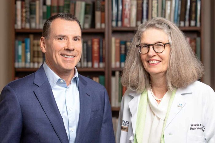 Lee Kling and Victoria Fraser, MD, smile for a photograph