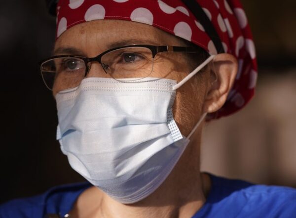 Nurse Teri Wheat poses for a photo in Fort Worth, Texas, Thursday, Nov. 19, 2020.