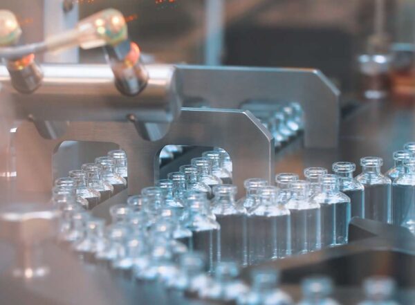 Glass vaccine vials in production line