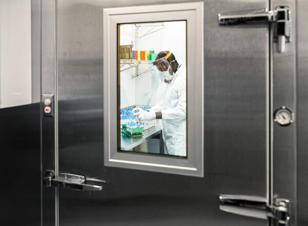 A research assistant works with live Covid-19 specimens at Downstate's BioBank in the Brooklyn, N.Y.