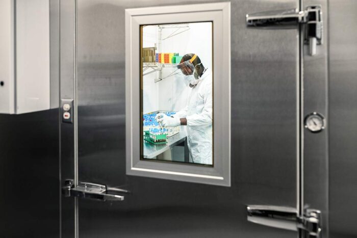 A research assistant works with live Covid-19 specimens at Downstate's BioBank in the Brooklyn, N.Y.