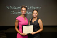 Makeba Williams accepts the Humanism in Medicine award from Isabella Gomes.