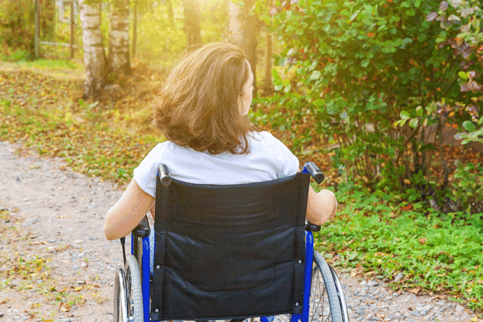 Woman in wheelchair outdoors