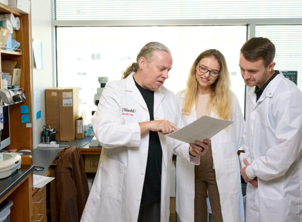 Jonathan Cooper, PhD, left, postdoctoral research associate Ewa Ziółkowska, PhD, and Matt Jensen