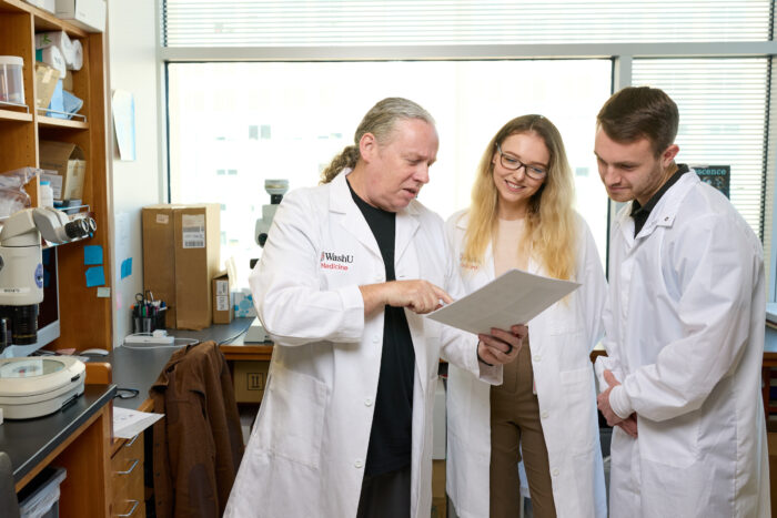 Jonathan Cooper, PhD, left, postdoctoral research associate Ewa Ziółkowska, PhD, and Matt Jensen