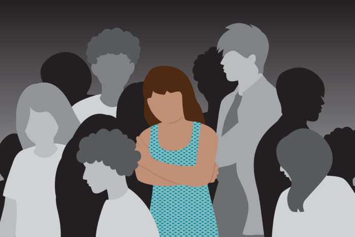 Illustration of adolescent girl with arms crossed isolated in a crowd of peers