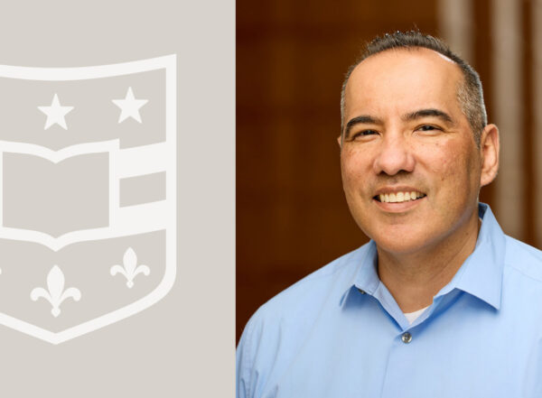 Benjamin Garcia with WashU Medicine shield