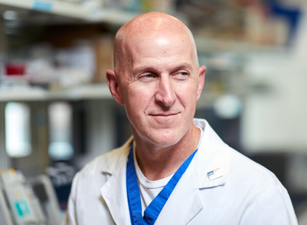 close-up photo of male physician in white coat