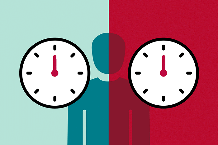 The gif shows to clocks, with the red clock on the right ticking by faster than the green clock on the left to depict faster biological aging.