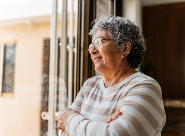Senior woman contemplating at home